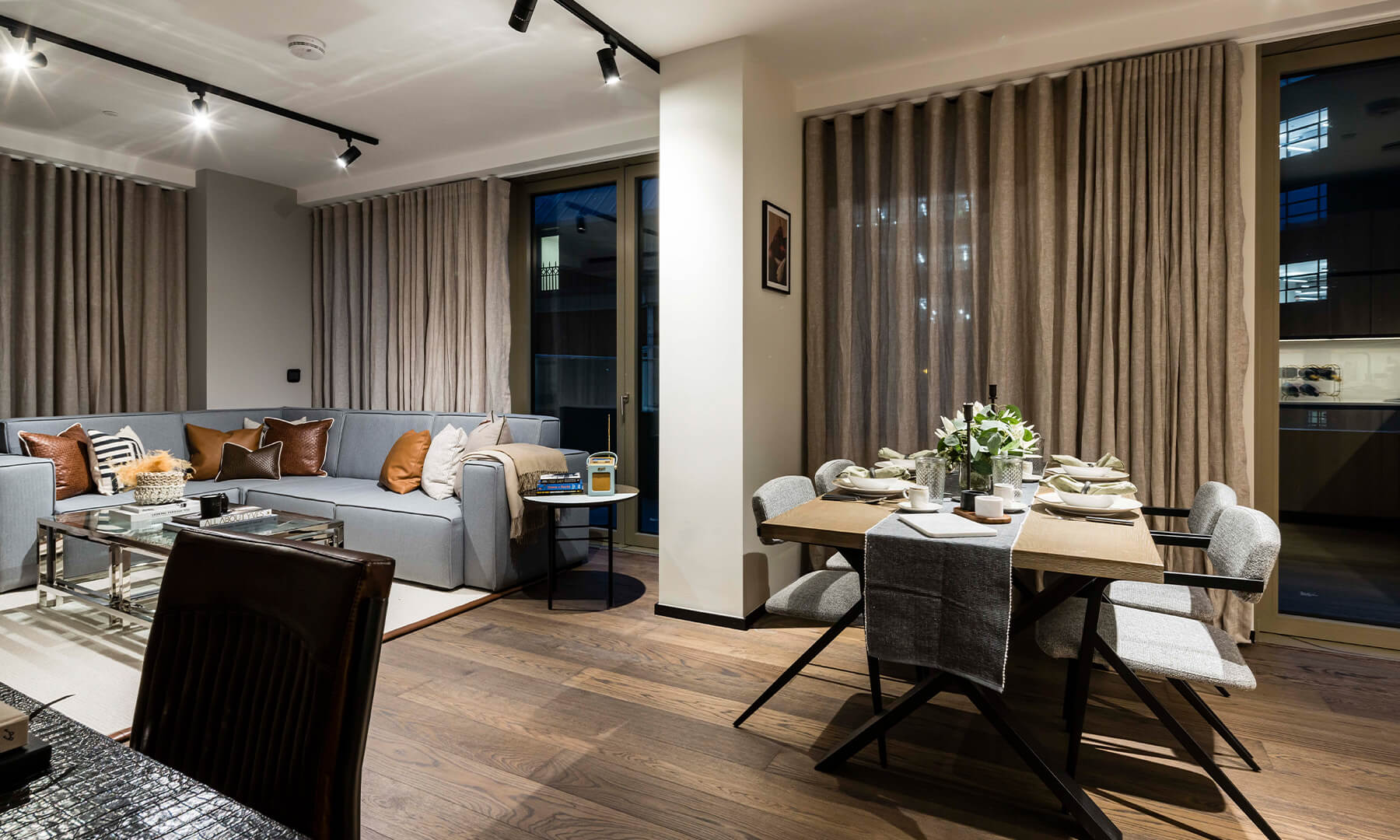 Open-plan living room of a one-bedroom apartment at The Stage, ©Galliard Homes.